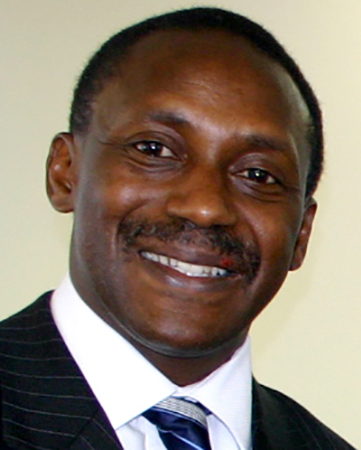 headshot of yumkella